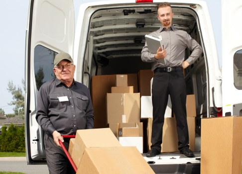 Office removals planning in Mortlake with moving boxes and desks
