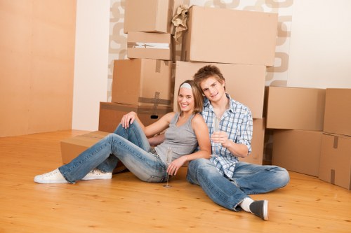Removal van and packed boxes for house removals in Mortlake