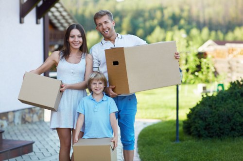 Professional small removals service in Mortlake loading furniture into a van