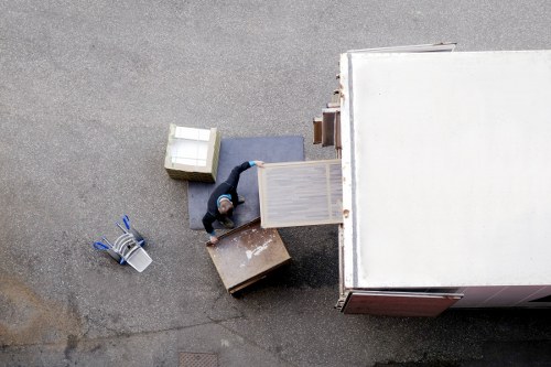 Staff applying health and safety standards in a storage facility