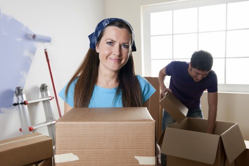 Local Mortlake removals team handling furniture and boxes carefully