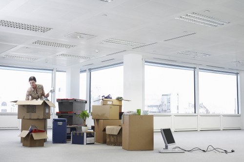 Office equipment and furniture being loaded for a Mortlake move