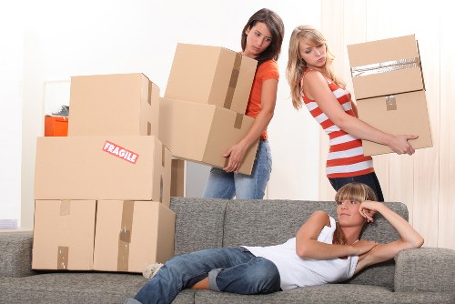 Packed storage boxes and furniture in a Mortlake self storage unit